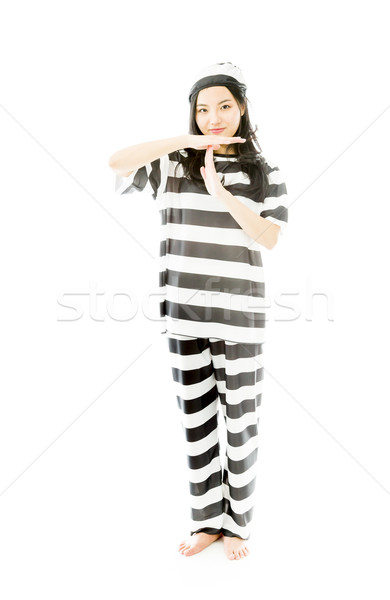 Young Asian woman making time out signal with hands in prisoners uniform Stock photo © bmonteny