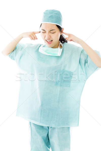 Asian female surgeon shouting with hands in ear Stock photo © bmonteny