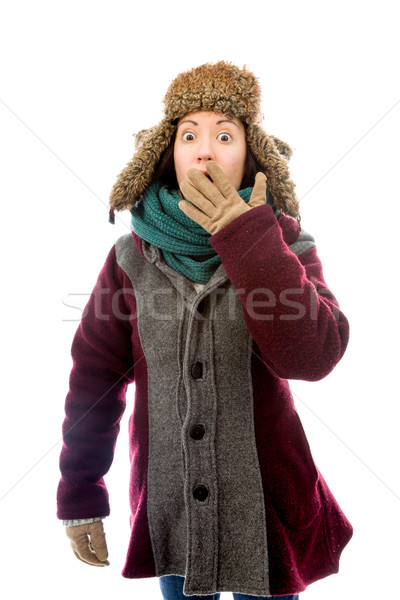 Young woman in warm clothing and looking shocked Stock photo © bmonteny