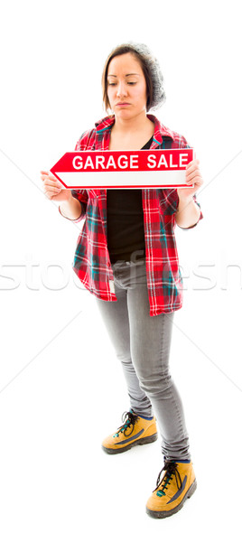 Saleswoman holding a Garage sale sign Stock photo © bmonteny