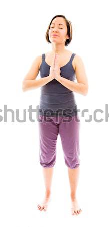 Young woman thinking with hand on chin Stock photo © bmonteny