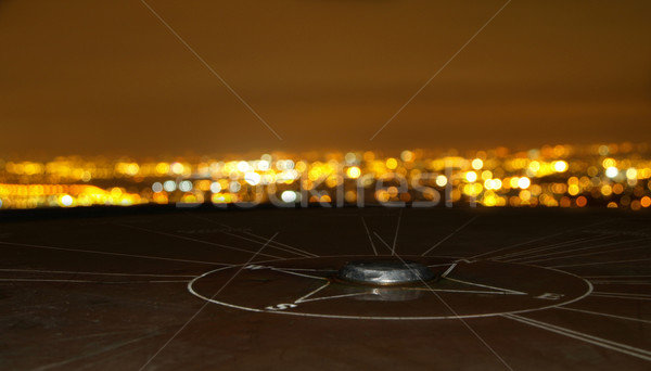 Kompass Stadtbild glühend Nacht Stadt Landschaft Stock foto © bobbigmac