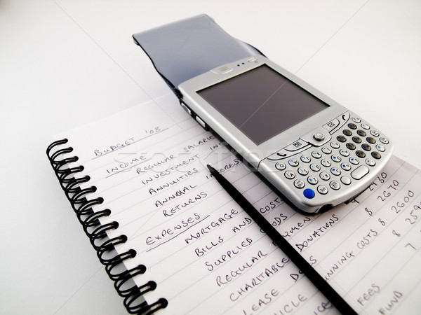 Pda smartphone schrijfstift home budget traditioneel Stockfoto © bobbigmac