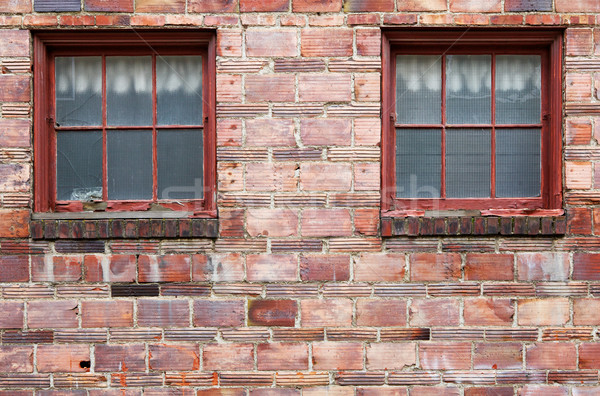 Ugly Old red brick wall windows Stock photo © bobkeenan