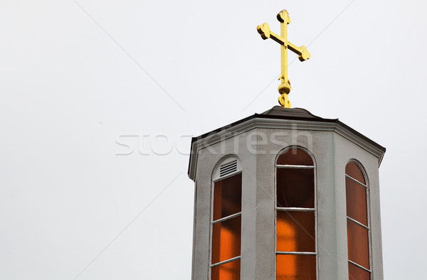 Ouro atravessar topo igreja laranja vintage Foto stock © bobkeenan