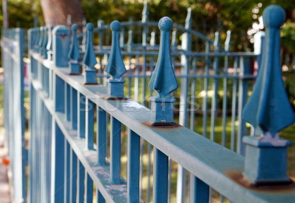 Blue spike fence Stock photo © bobkeenan