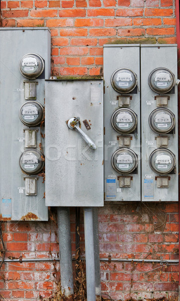 Stock photo: Eight old power meters