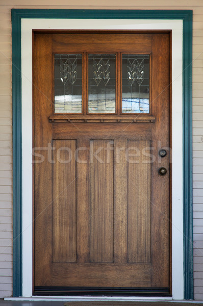 Decco glassed stained wood door Stock photo © bobkeenan
