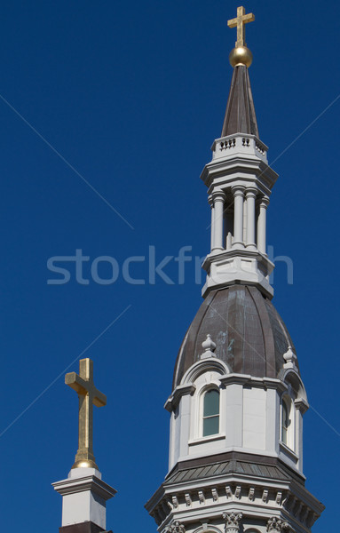 Dos cruces oro catedral profundo cielo azul Foto stock © bobkeenan