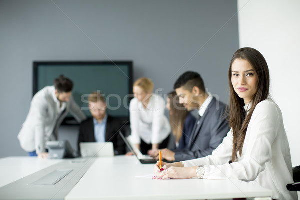 Business team working together to achieve better results Stock photo © boggy