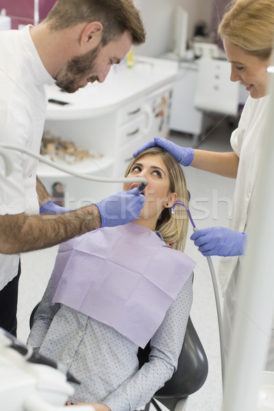 Dentaires jeune femme traitement heureux médicaux [[stock_photo]] © boggy