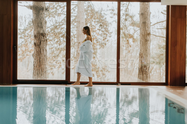 Joli jeune femme détente piscine spa centre [[stock_photo]] © boggy