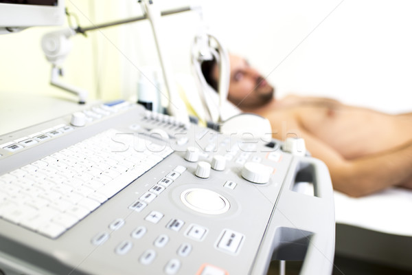 Young male patient in the ultrasound examination Stock photo © boggy