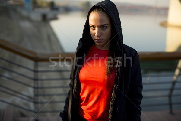 Young woman exercising outside Stock photo © boggy