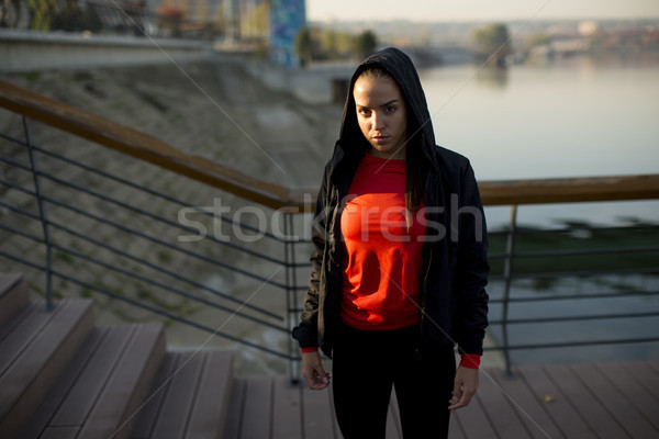 Young woman exercising outside Stock photo © boggy