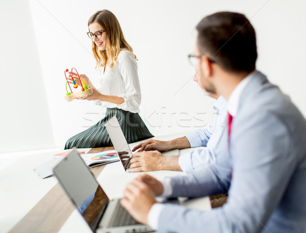 Business people around table during staff meeting Stock photo © boggy