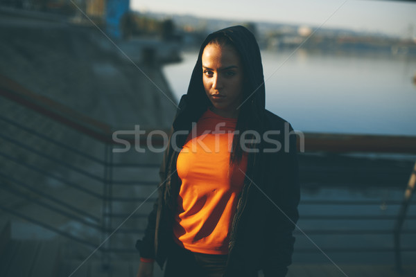 Young woman exercising outside Stock photo © boggy