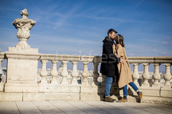 Couple in love hugging of the magnificent landscape view of Buda Stock photo © boggy