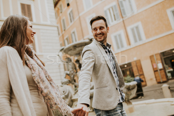 Stock photo: Happy loving couple, man and woman traveling on holiday in Rome,