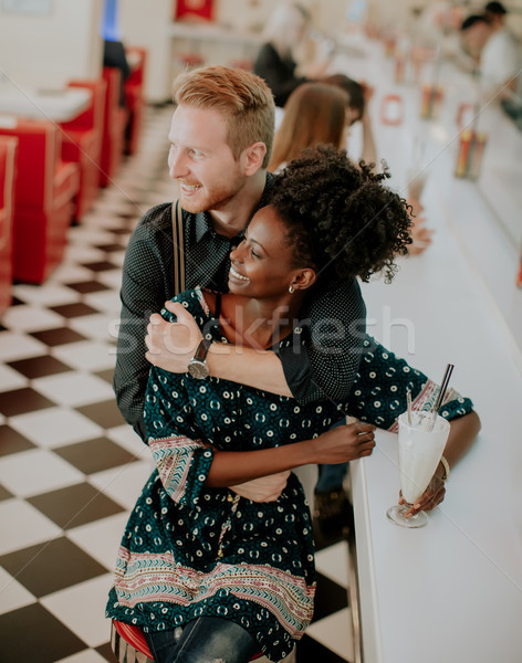 Couple hugging by the bar in the diner Stock photo © boggy