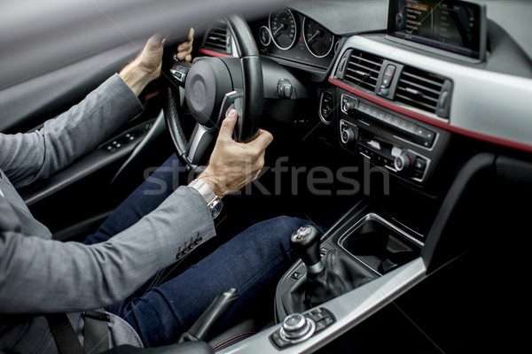Сток-фото: молодым · человеком · вождения · современных · автомобилей · молодые · бизнесмен
