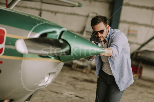 Jóvenes piloto avión vuelo guapo hombre Foto stock © boggy