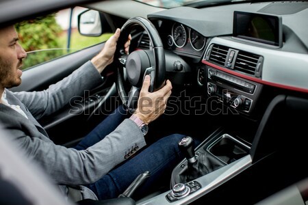 Young man in the car Stock photo © boggy
