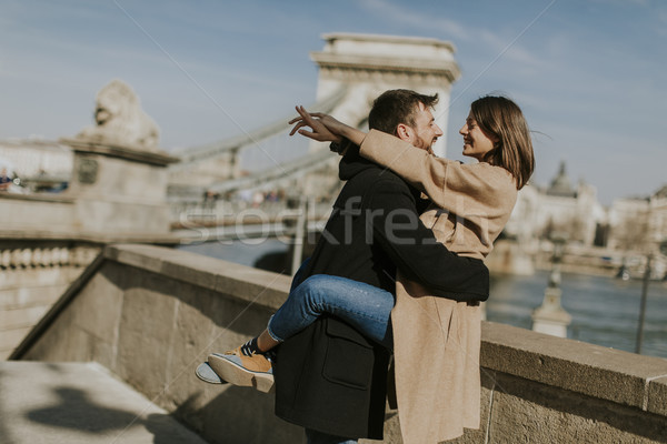 Couple in love hugging of the magnificent landscape view of Buda Stock photo © boggy