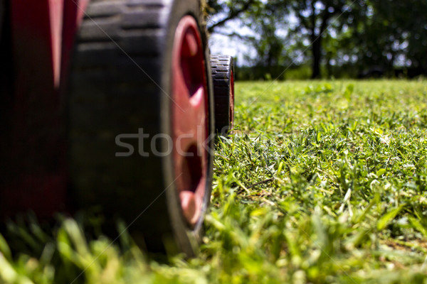 Lawnmover in the green field Stock photo © boggy