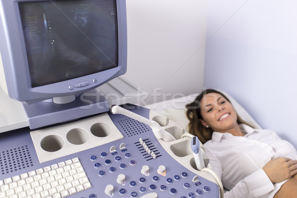 Young female patinet have ulstrasound examination of the abdomen Stock photo © boggy