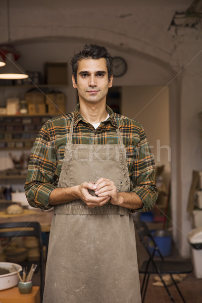 élégant jeune homme poterie atelier argile [[stock_photo]] © boggy