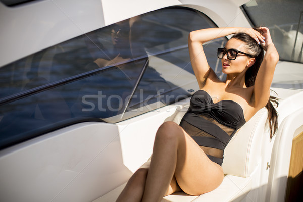 Joli jeune femme détente yacht femmes Photo stock © boggy