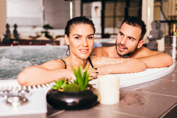 Loving couple in the wellness center Stock photo © boggy