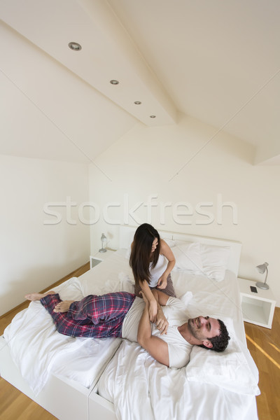 Couple Having Fun In Bed Stock Photo C Goran Bogicevic