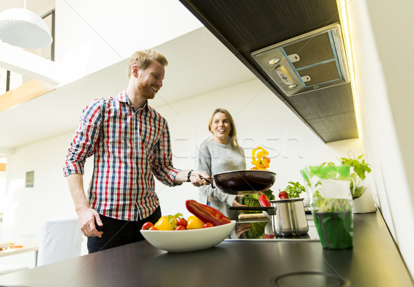 Young couple in the kitchen Stock photo © boggy