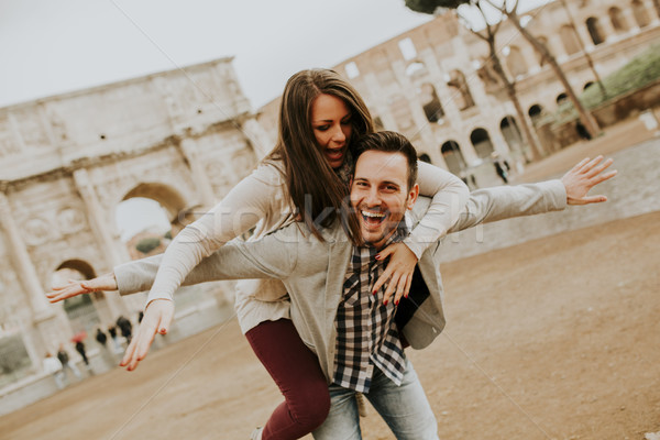 Happy loving couple, man and woman traveling on holiday in Rome, Stock photo © boggy