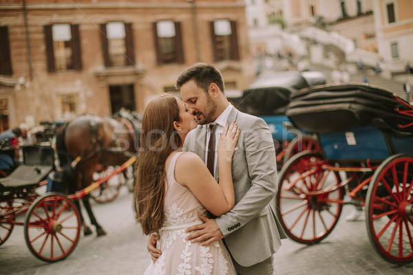 Young wedding couple near Spanish steps (Scalinata di Trinità d Stock photo © boggy