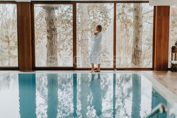 Joli jeune femme détente piscine spa centre [[stock_photo]] © boggy