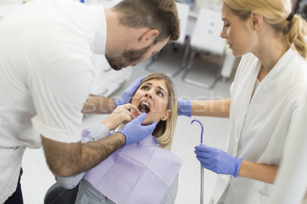 Dental mulher jovem tratamento feliz médico Foto stock © boggy