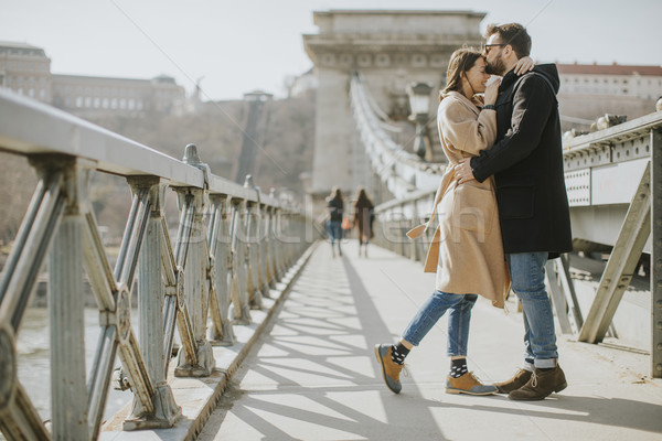Loving couple on Chain bridge, Budapest Stock photo © boggy
