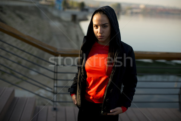 Young woman exercising outside Stock photo © boggy