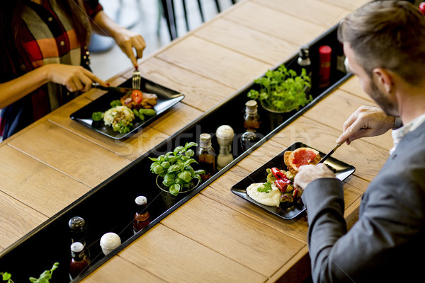 Couple in restaurant Stock photo © boggy