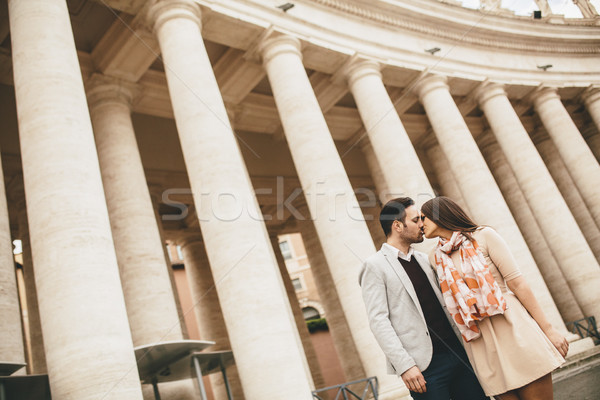 Loving couple at the St. Peter's Square in Vatican Stock photo © boggy