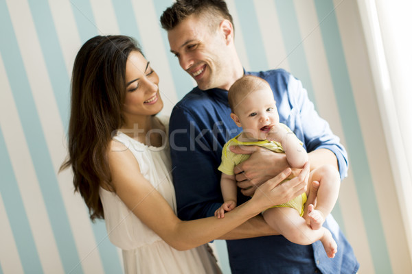 Portrait of mother and  father with cute little baby girl daught Stock photo © boggy