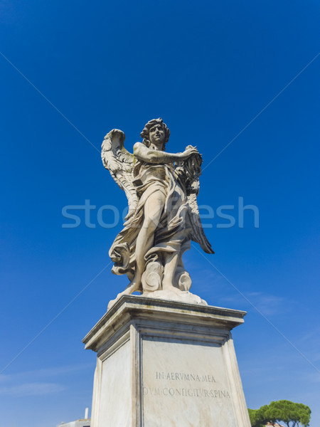 Angel statue at Sant Angelo Bridge in Rome Stock photo © boggy