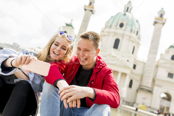 Dating young couple happy in love taking selfie self-portrait ph Stock photo © boggy