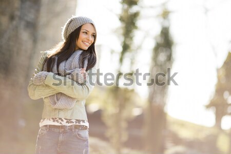 Stock photo: Young woman on the bicycle