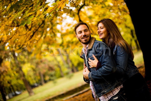 Loving couple in the autumn park Stock photo © boggy