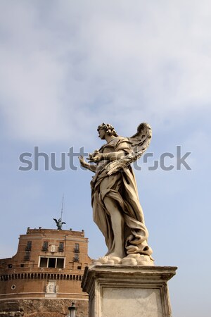 Angel statue at Sant Angelo Bridge in Rome Stock photo © boggy