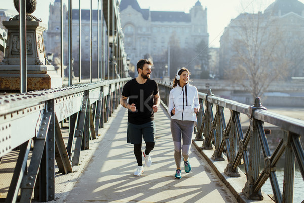 Young couple running in the morning Stock photo © boggy